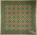 Pieced diamond pattern quilt