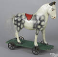 Composition platform horse pull toy