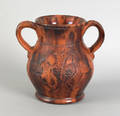 Pennsylvania redware two handled vase attributed to Jacob Medinger ca 1900