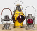 Three railroad lamps