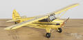 Painted airplane model of a Piper cub