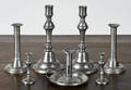 Seven pewter candlesticks 19thearly 20th c