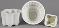 Three ironstone and pearlware food molds