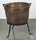 Copper apple butter kettle with an iron stand