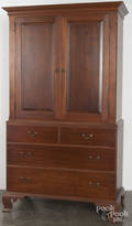 Irion  Co Chippendale style walnut linen press