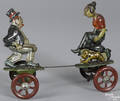 Nifty tin lithograph windup Maggie and Jiggs platform spring toy