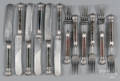 Twelve English silver and hardstone handled utensils