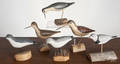Three carved and painted shorebird decoys