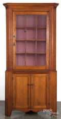 Pennsylvania cherry twopart corner cupboard