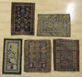 Three Caucasian mats