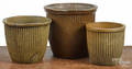 Three ribbed stoneware crocks