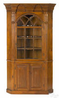 Diminutive Pennsylvania pine onepiece architectural corner cupboard ca 1790