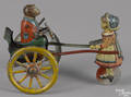 Gama tin lithograph lever action monkey in a cart toy