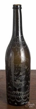 Etched olive green wine bottle