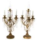 A Pair of Louis XVI Style ThreeLight Gilt Bronze and Cut Crystal Candelabra