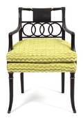 A Regency Style Ebonized Open Armchair