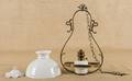 Victorian brass hall light with a milk glass shade