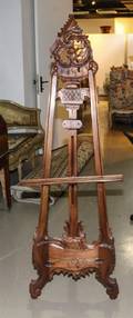 A Carved Mahogany Easel