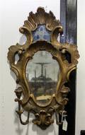 An Italian Baroque Style Giltwood Mirror