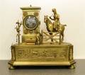 A French Gilt Metal Figural Clock