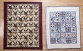 Two patchwork quilts