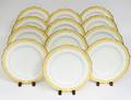 TWELVE CAULD0N YELLOW  GOLD PORCELAIN DINNER PLATES