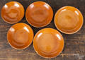 Five Pennsylvania redware plates