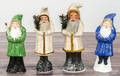Four contemporary chalkware belsnickle Santa Claus figures