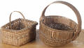 Two miniature woven baskets