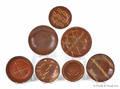 Seven Pennsylvania slip decorated redware plates and bowls
