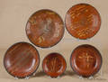 Five Pennsylvania slip decorated redware plates