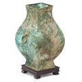 Archaic chinese bronze vase on stand