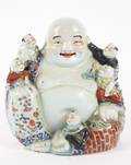 Japanese Porcelain Figural Group Hotei