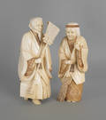 Pair of Japanese carved elephant ivory of a man and woman