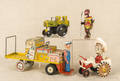 Four tin windup toys