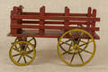 Painted wood wagon with iron wheels