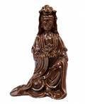 A RARE DEHUA BROWNGLAZED FIGURE OF GUANYIN QING DYNASTY 18TH CENTURY