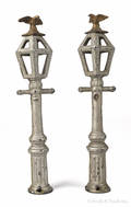 Pair of cast iron street lamps with eagle finials