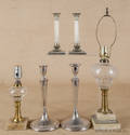 Two pair of silver plated candlesticks