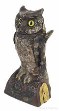 Cast iron Owl Turns Head mechanical bank manufactured by J  E Stevens Company