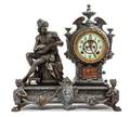A Cast Metal Figural Mantle Clock