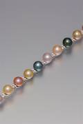 An 18 Karat White Gold Diamond and Cultured Multicolor Pearl Bracelet