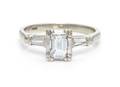 A 14 Karat White Gold and Diamond Ring