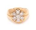 An 14 Karat Yellow Gold and Diamond Ring