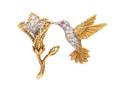 An 18 Karat Platinum Diamond and Ruby En Tremblant Hummingbird Brooch