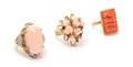 A Collection of Yellow Gold Coral and Multigem Rings