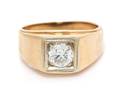 A 14 Karat Yellow Gold and Diamond Ring