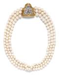 An 18 Karat Yellow Gold Platinum Diamond and Graduated Triple Strand Cultured Pearl Necklace