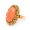 A 14 Karat Yellow Gold and Coral Ring