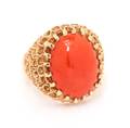A 14 Karat Yellow Gold and Coral Ring